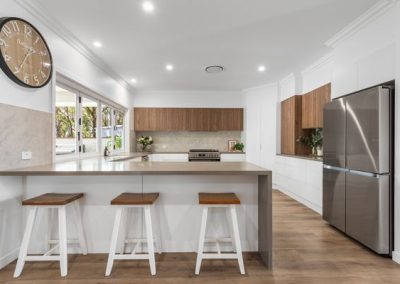 Flynn Dr, 54 (17) | Freeman Quality Builder Warwick QLD Modern contemporary house exterior with warm lighting and landscaped front yard.