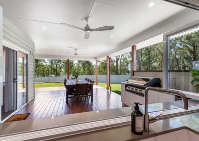 Flynn Dr, 54 (19) | Freeman Quality Builder Warwick QLD Modern contemporary home exterior with warm entry lighting and landscaped driveway.